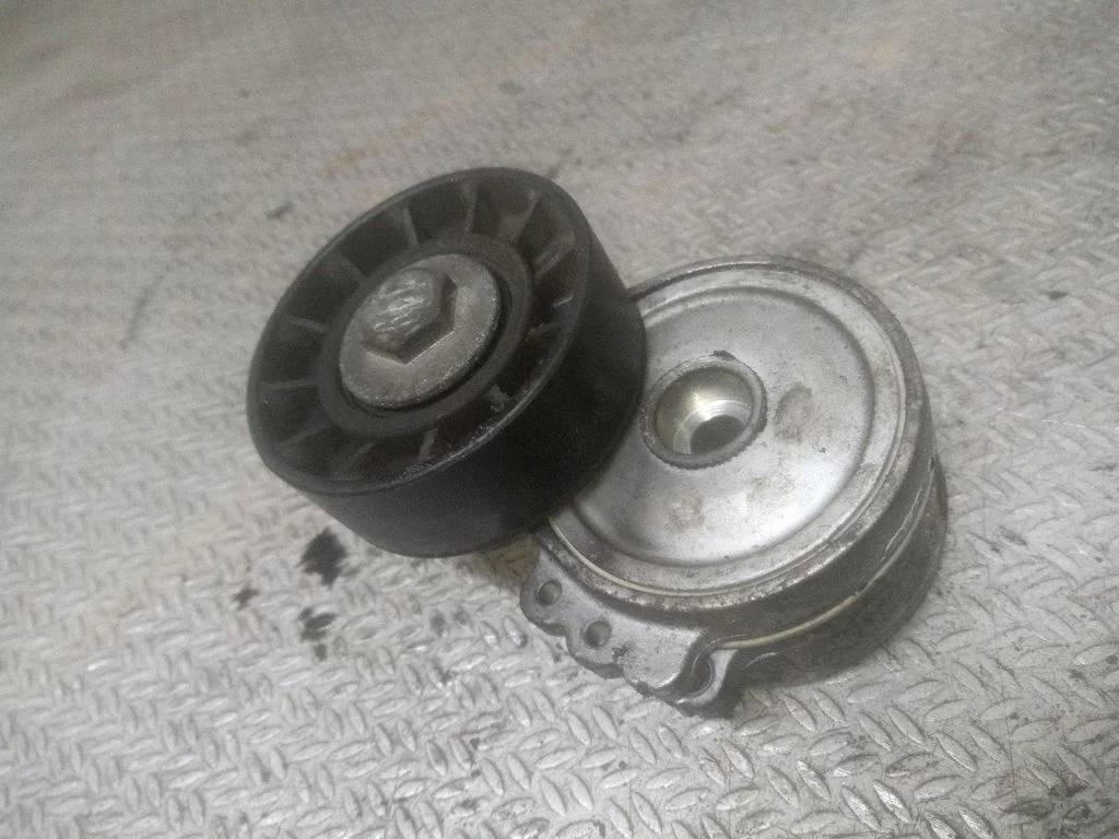 Alternator belt tensioner APV1114