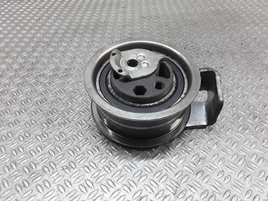 Timing belt tensioner