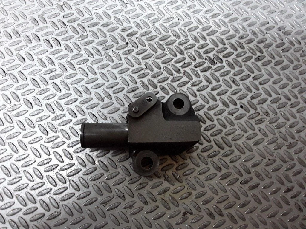 Timing belt tensioner