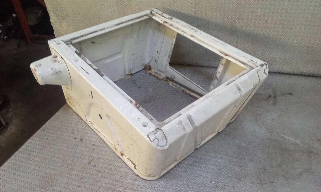 Driver seat console base – left