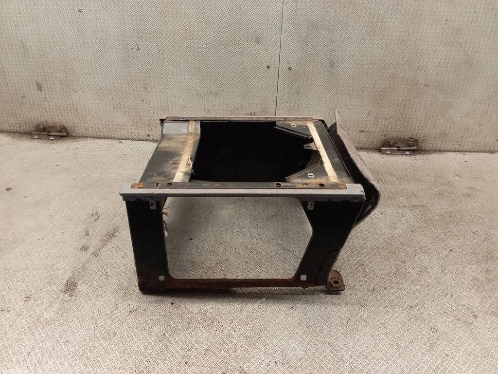 Driver seat console base – left