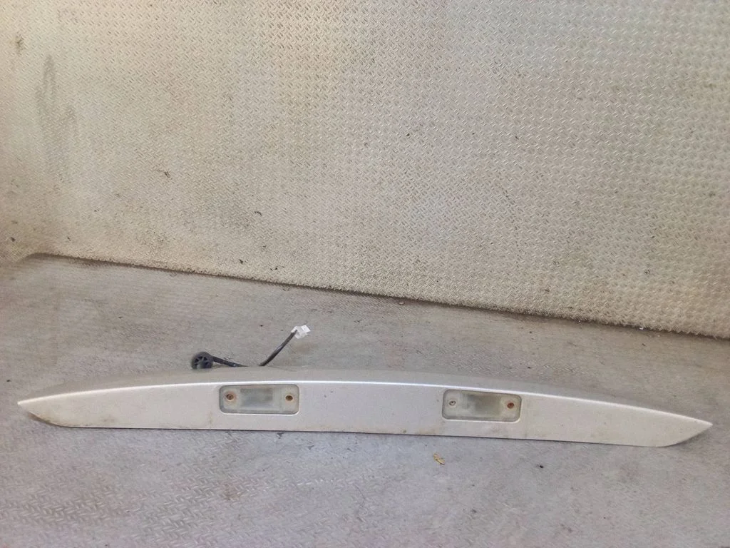Trunk door license plate light bar 873112B000