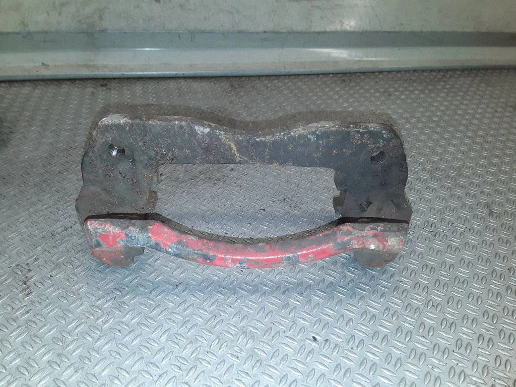 Front Brake Caliper Pad/Carrier