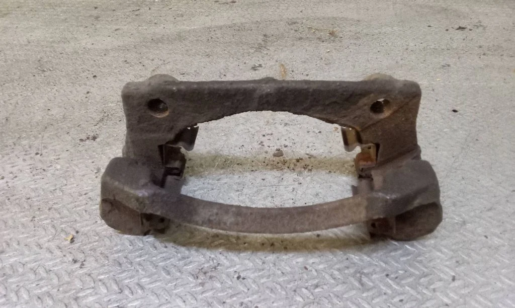 Front Brake Caliper Pad/Carrier