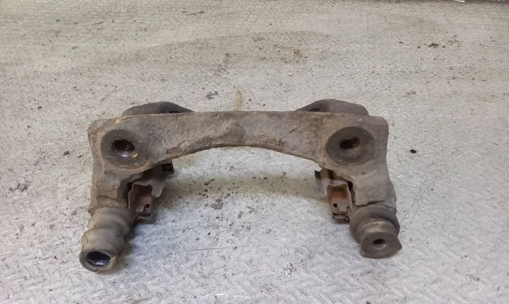 Front Brake Caliper Pad/Carrier