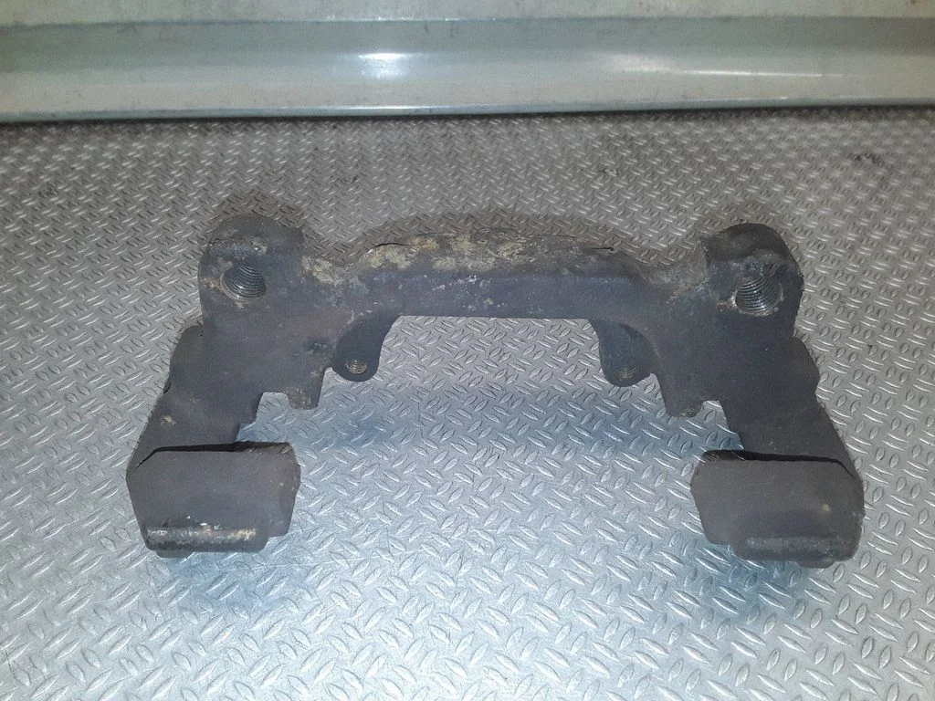 Front Brake Caliper Pad/Carrier