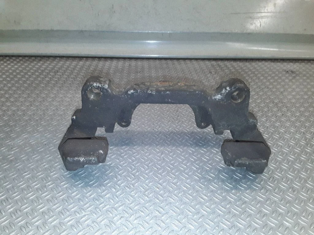 Front Brake Caliper Pad/Carrier