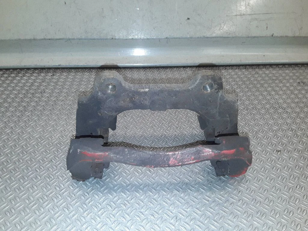 Front Brake Caliper Pad/Carrier