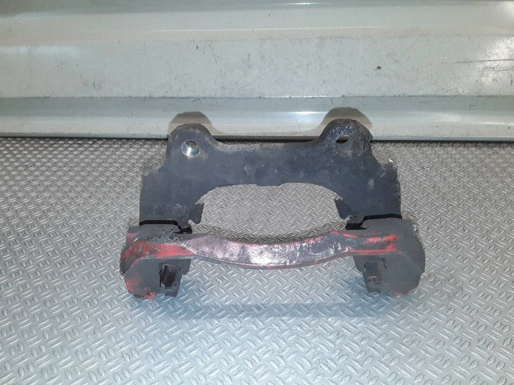 Front Brake Caliper Pad/Carrier