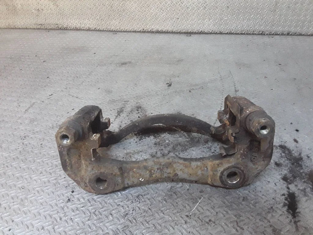 Front Brake Caliper Pad/Carrier