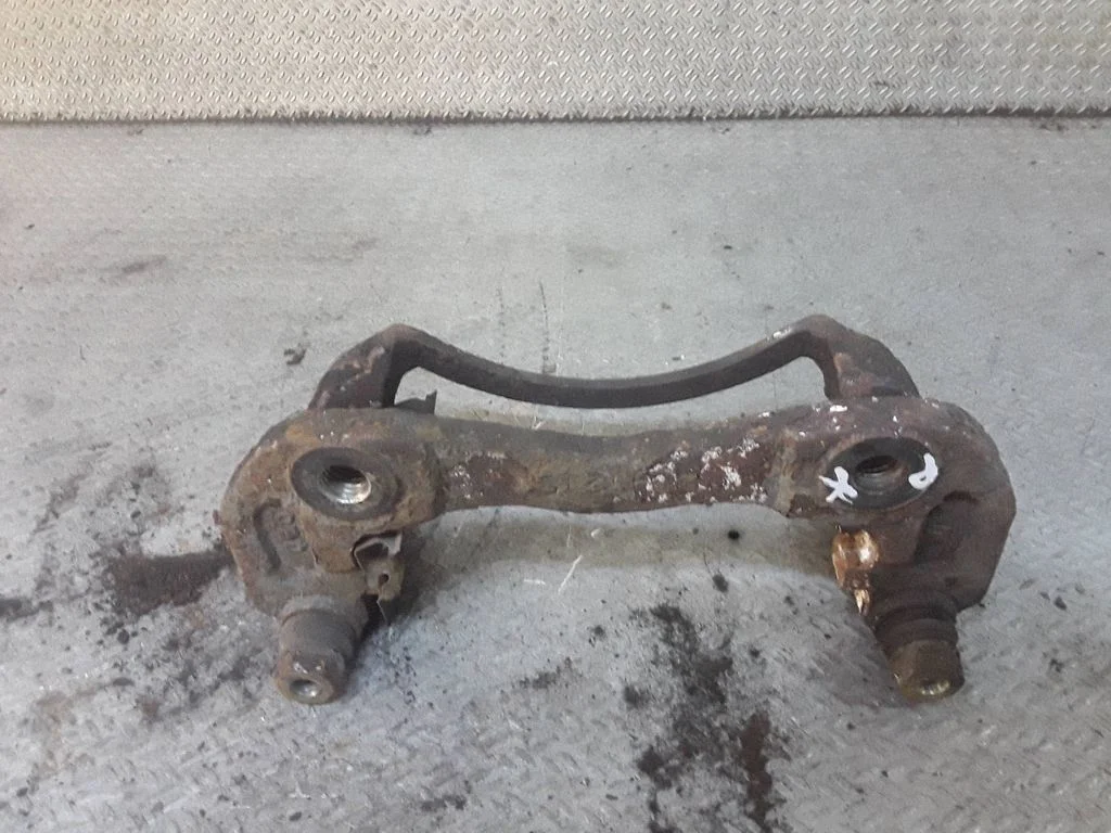 Front Brake Caliper Pad/Carrier