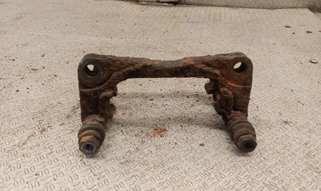 Front Brake Caliper Pad/Carrier