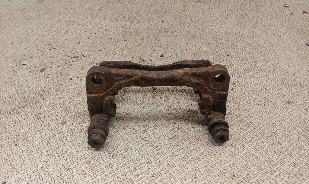 Front Brake Caliper Pad/Carrier
