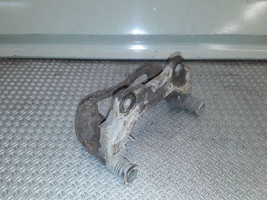 Front Brake Caliper Pad/Carrier – right