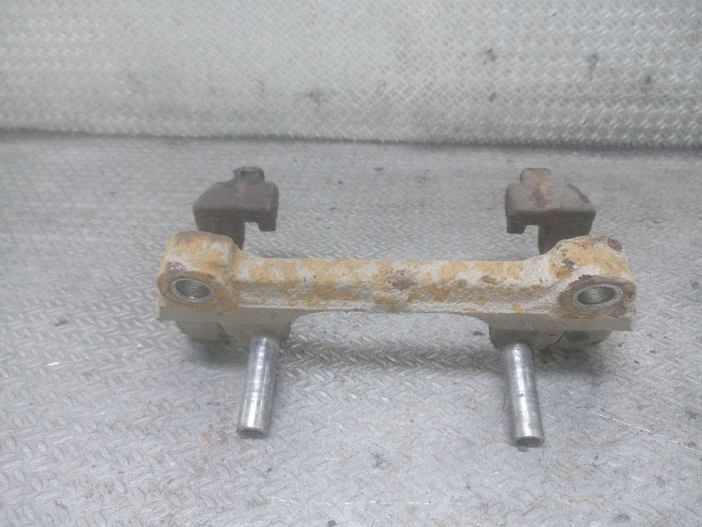 Front Brake Caliper Pad/Carrier