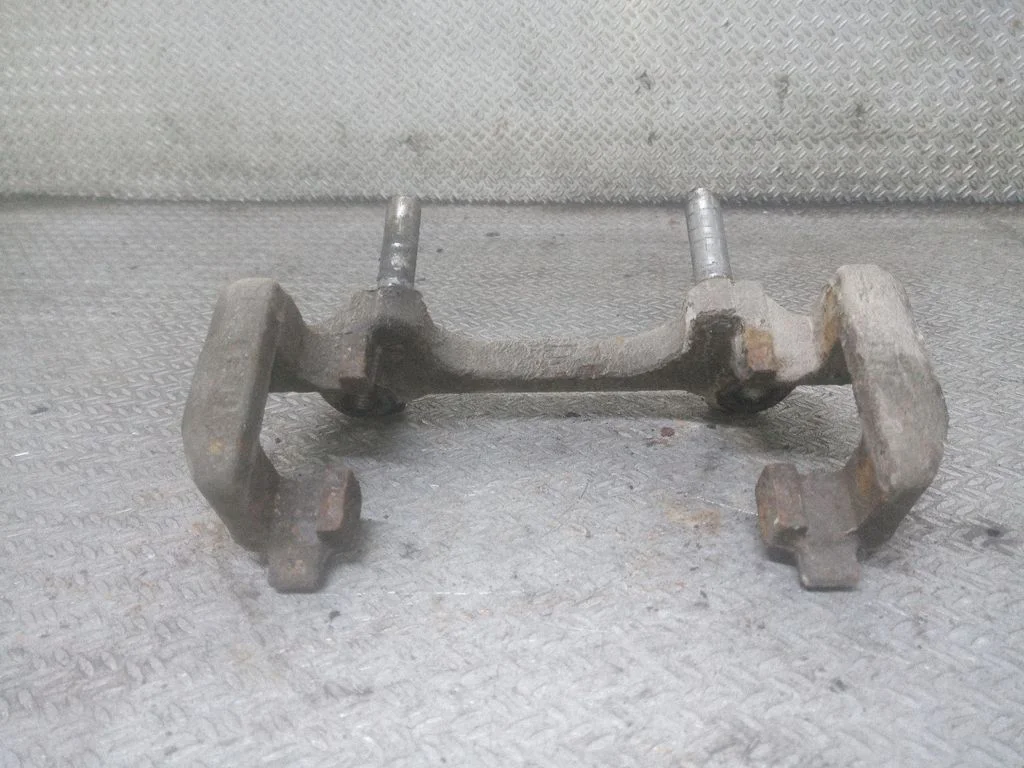 Front Brake Caliper Pad/Carrier