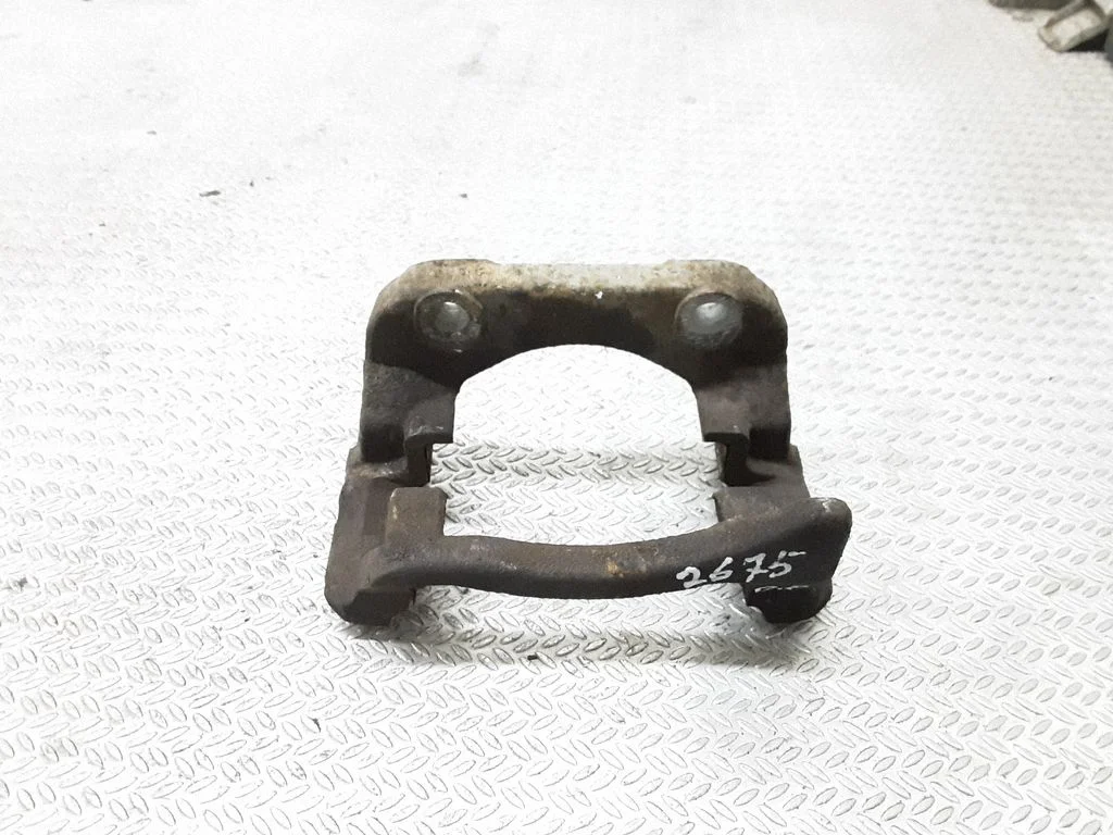 Front Brake Caliper Pad/Carrier – right