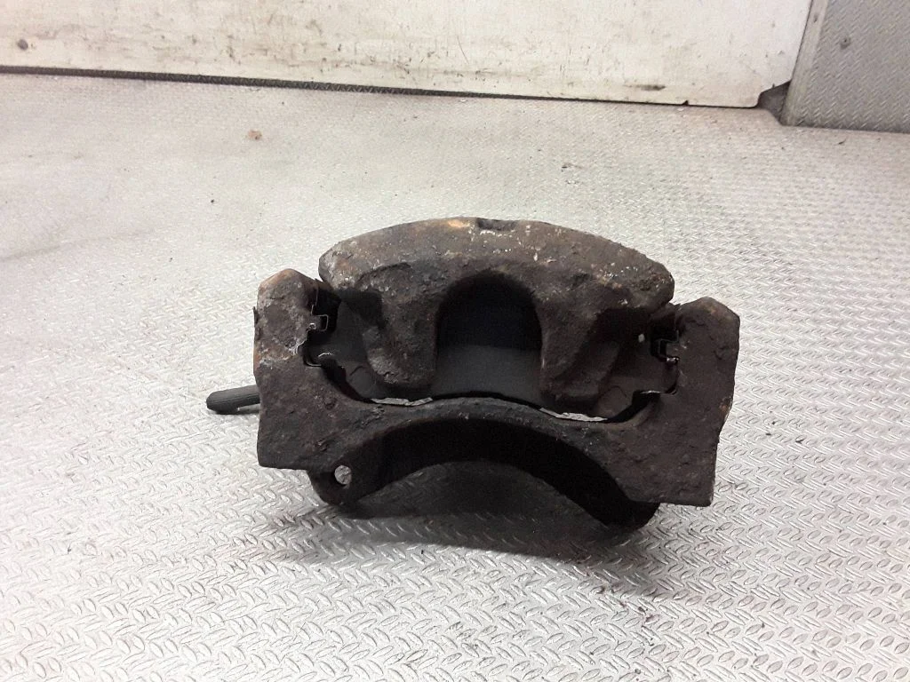 Front brake caliper – right
