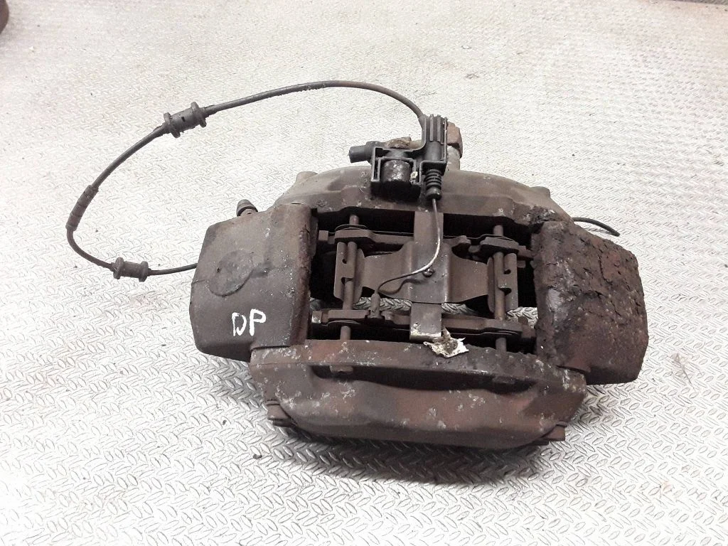 Front brake caliper – right