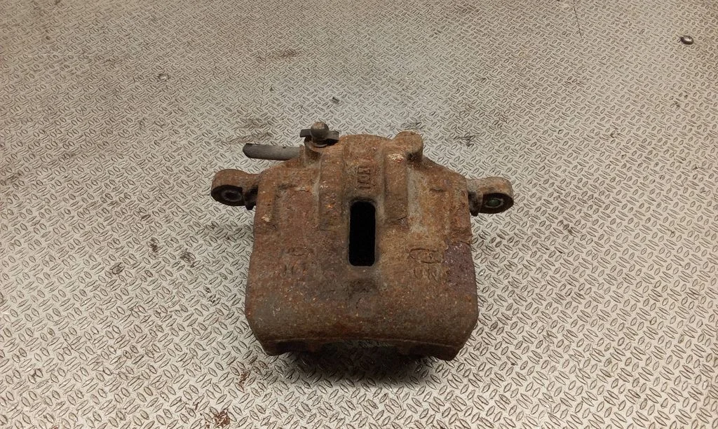 Front brake caliper – left