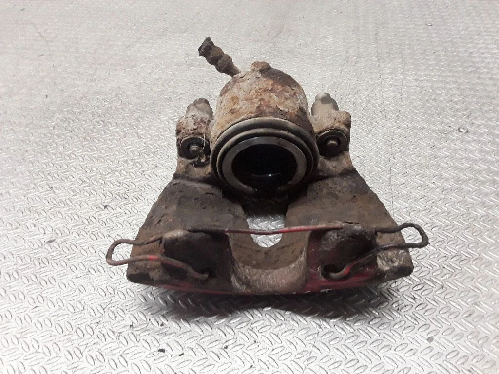 Front brake caliper – left