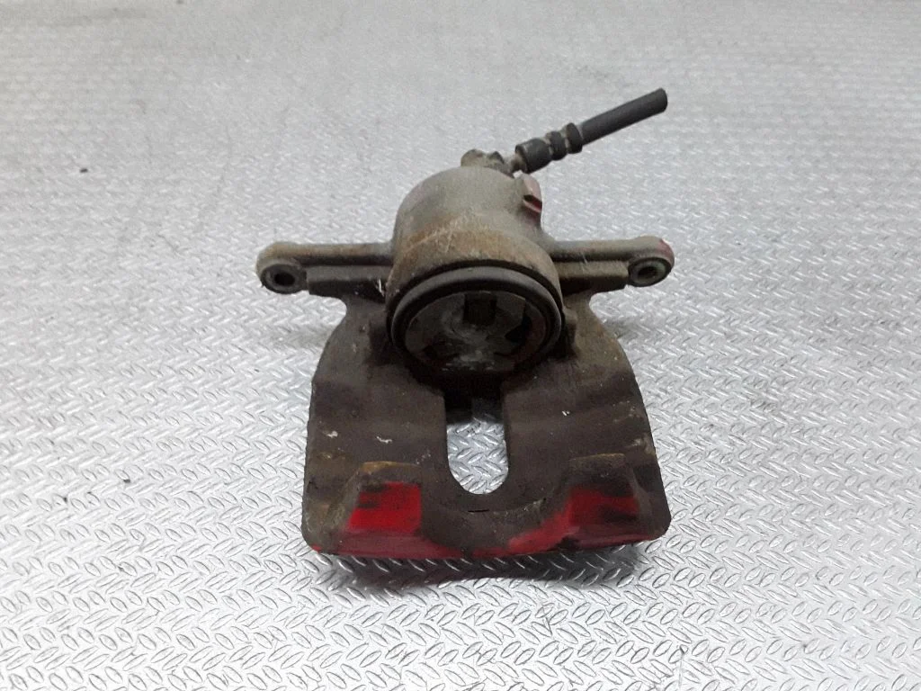 Zacisk hamulcowy przedni – prawa