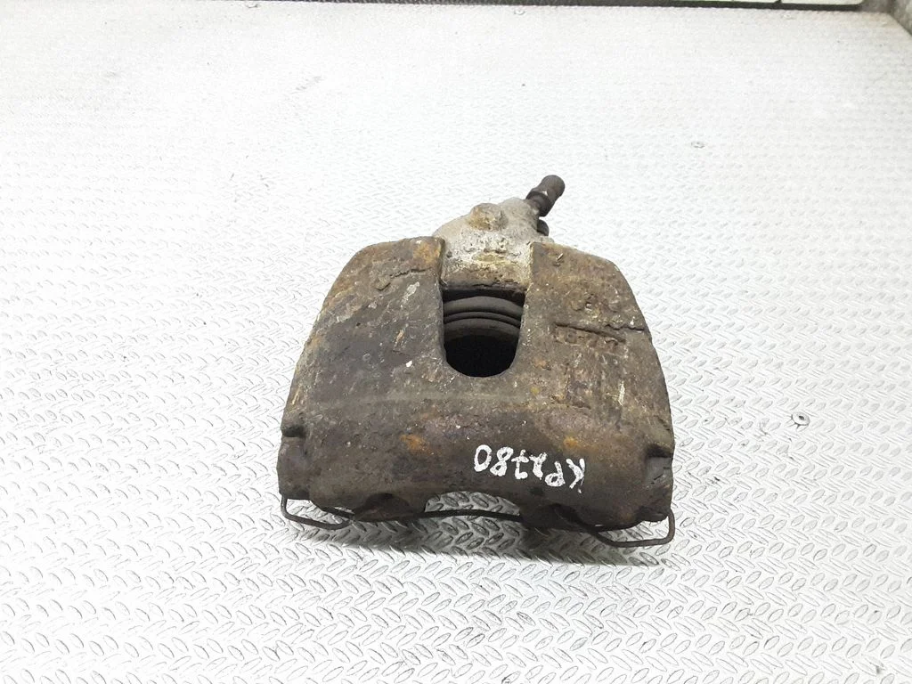 Front brake caliper – left