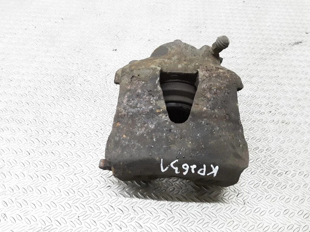 Zacisk hamulcowy przedni – lewa