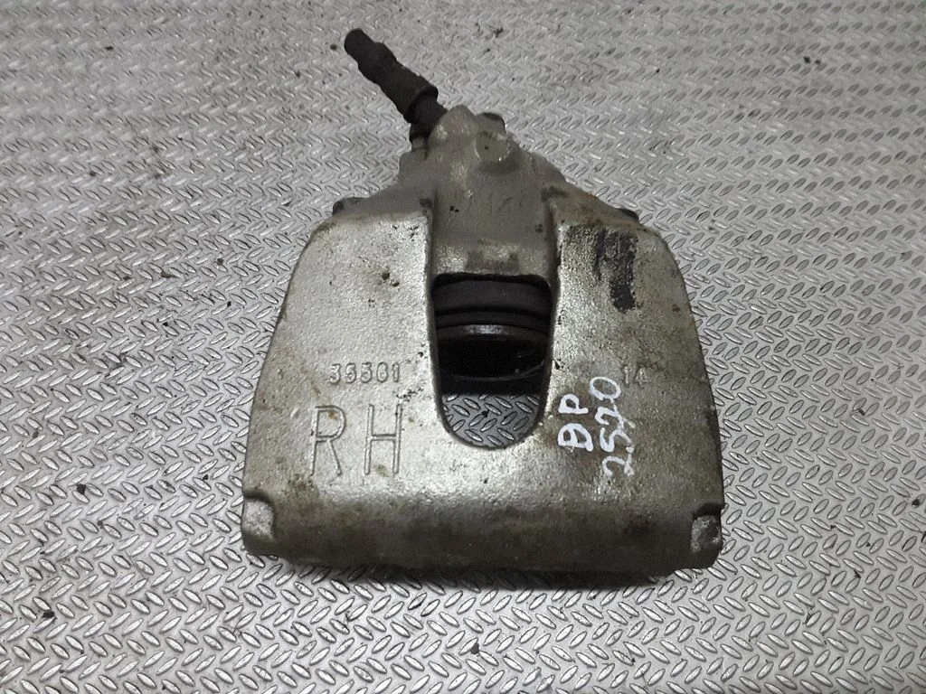 Front brake caliper – right
