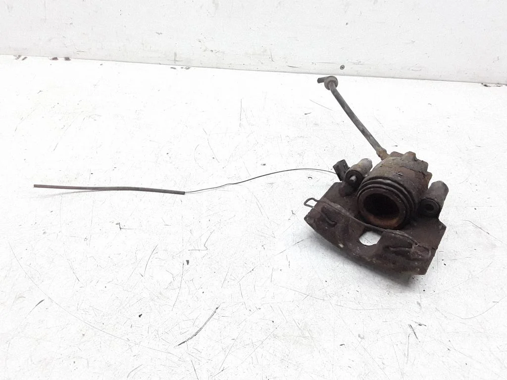 Front brake caliper – Ford Cougar (1998-2002), left