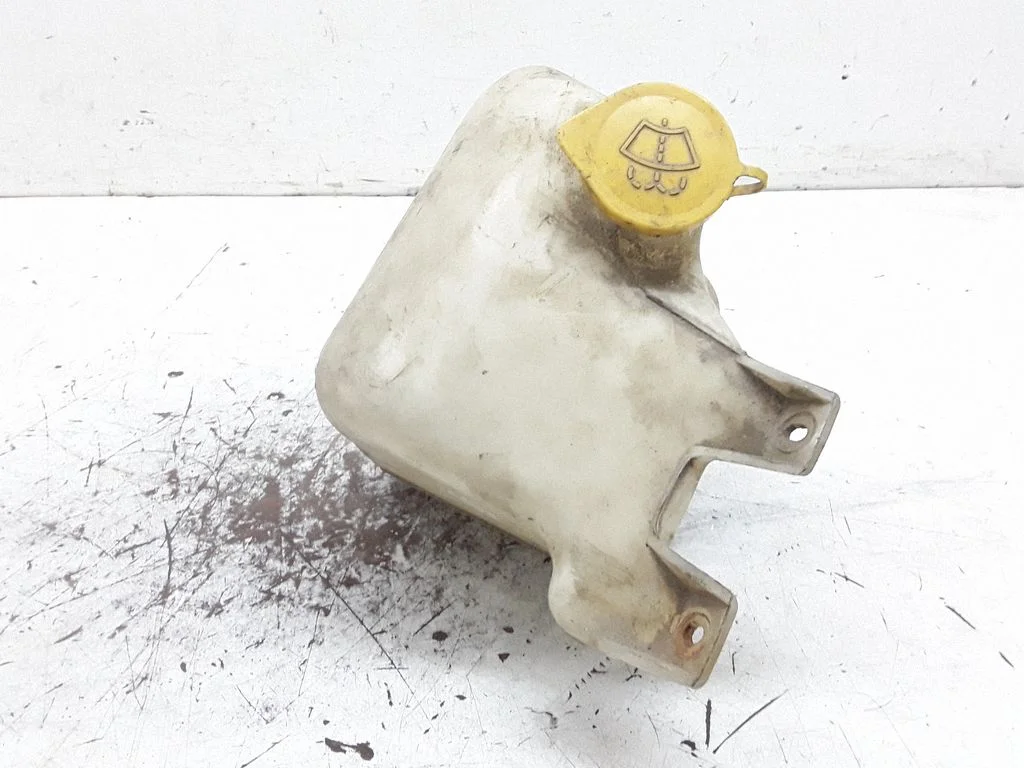 Windshield washer fluid reservoir/tank – Subaru Legacy (1999-2003)