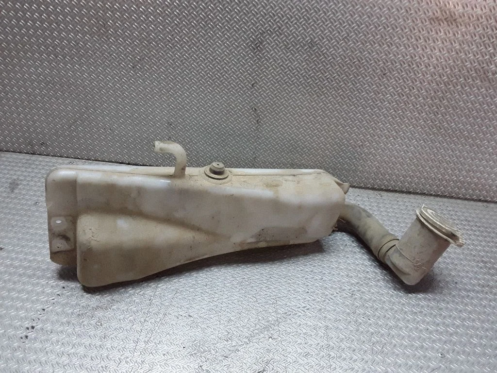 Windshield washer fluid reservoir/tank – Mitsubishi Pajero (1991-1999)