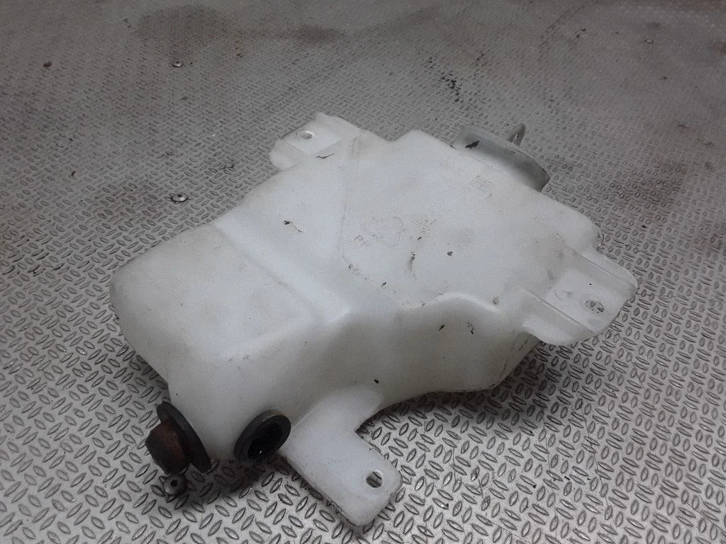 Windshield washer fluid reservoir/tank – Mitsubishi Pajero Sport I (1996-2008)