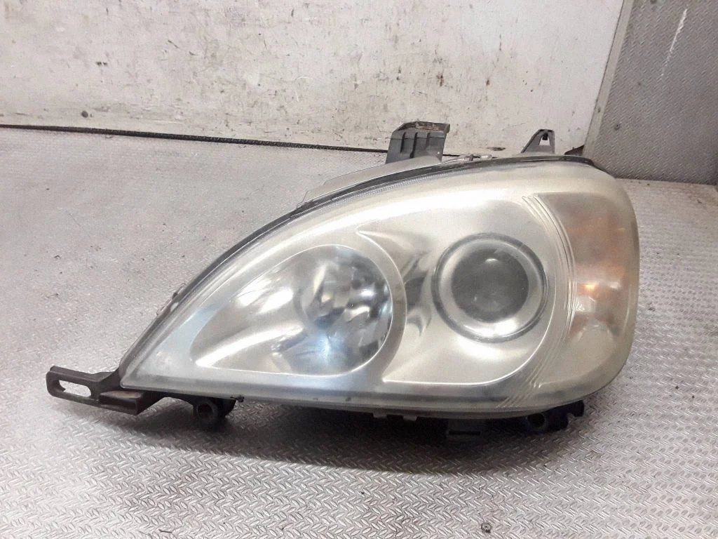 Headlight/headlamp – left