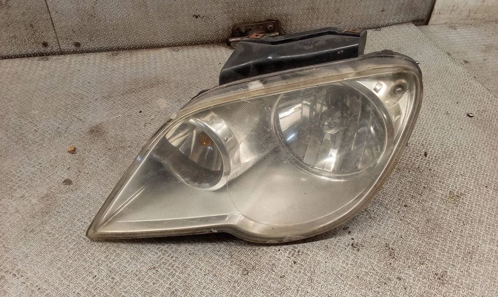 Headlight/headlamp – left