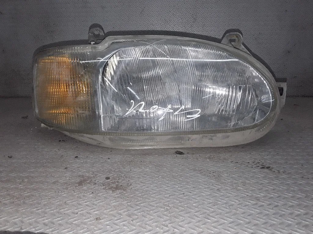 Priekšējais lukturis 95AG13W029DD – Ford Escort (1995-2004)