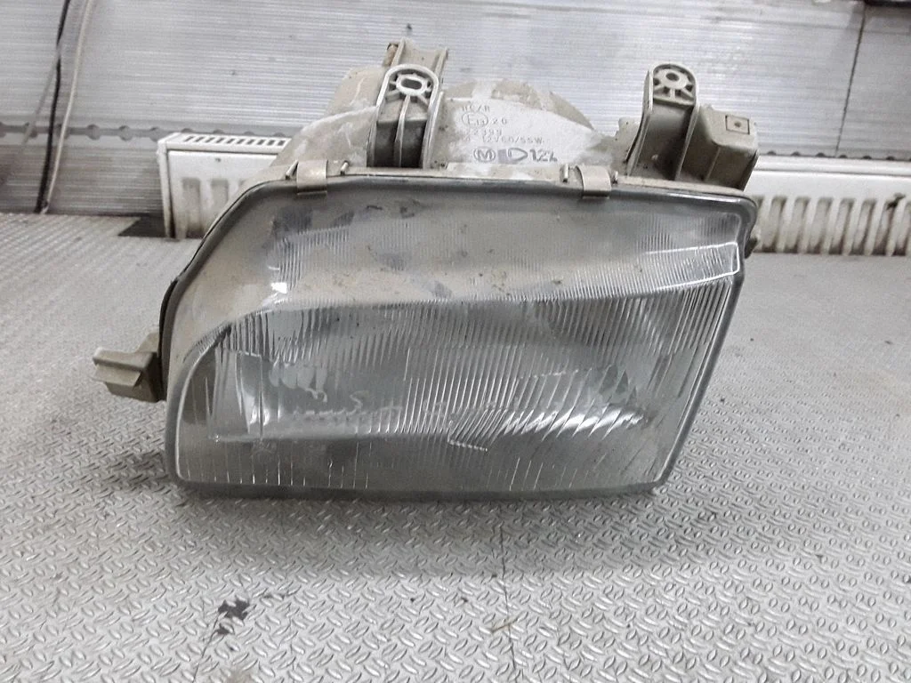 Priekšējais lukturis E1320022399 – Daihatsu Charade (1994-2000)