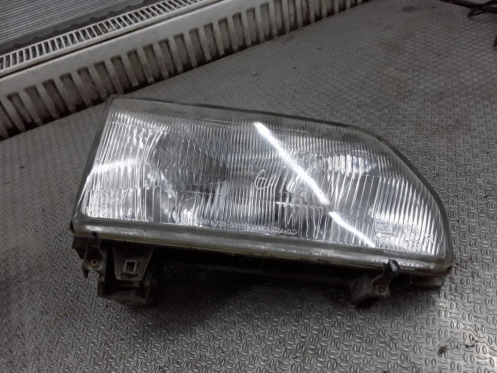 Headlight/headlamp K77051020 – KIA Clarus (1997-1999)