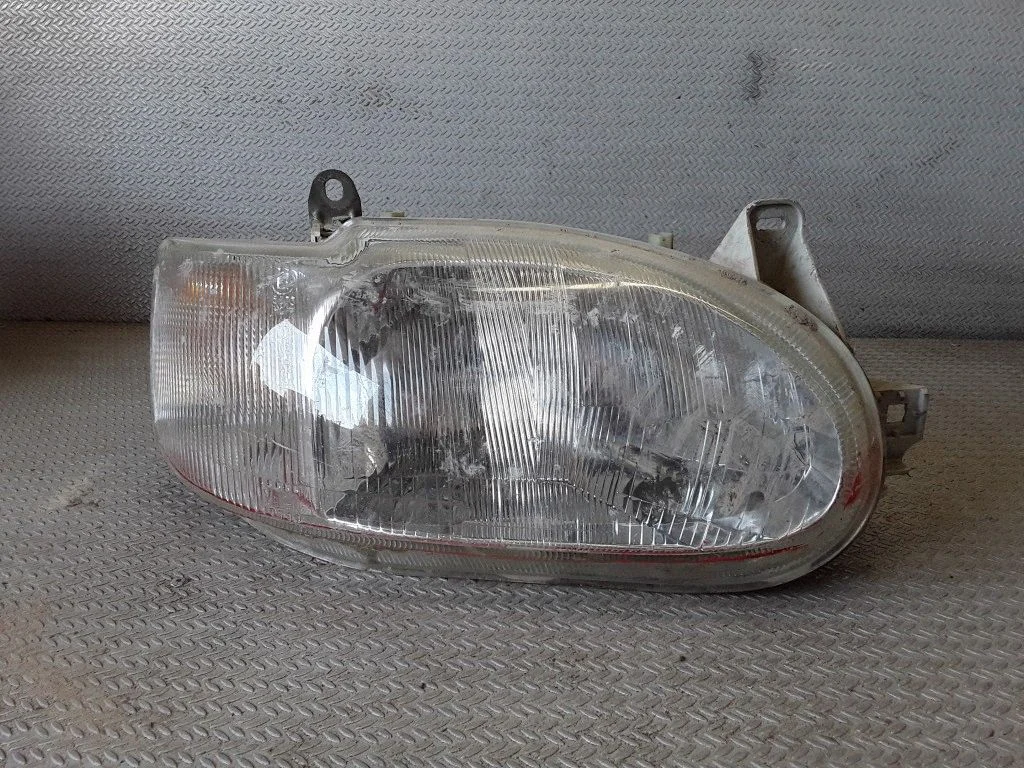 Priekšējais lukturis 95AG13W029DD – Ford Escort (1995-2004)