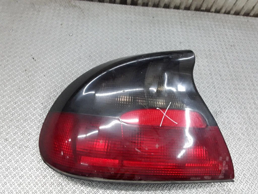 Aizmugurējais lukturis virsbūvē E95065 – Opel Tigra A (1994-2000)