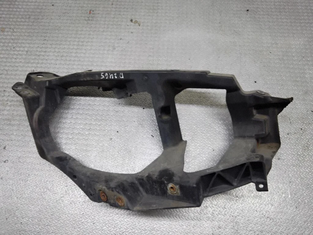 Headlight/headlamp mounting bracket – Mitsubishi Colt (1996-2004)