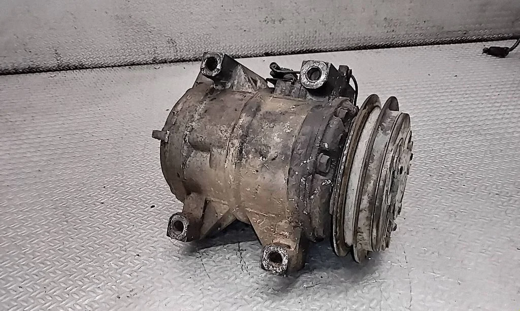 Kliimakompressor (pump) – Nissan Navara D22 (1997-2004)