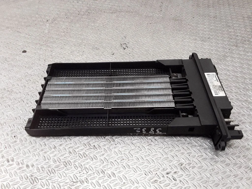 Elektryczna nagrzewnica kabiny 13590315