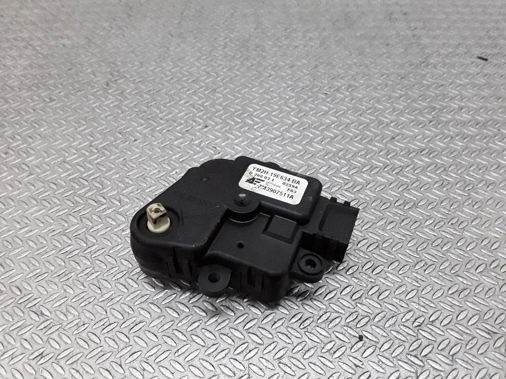 Silniczek klapki nawiewu YM2H19E634BA