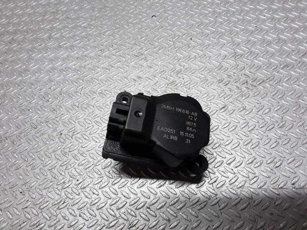 Silniczek klapki nawiewu 3M5H19E616AB