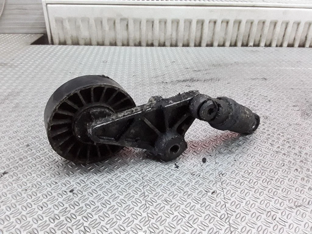 Generator/alternator belt tensioner – Opel Frontera B (1998-2004)