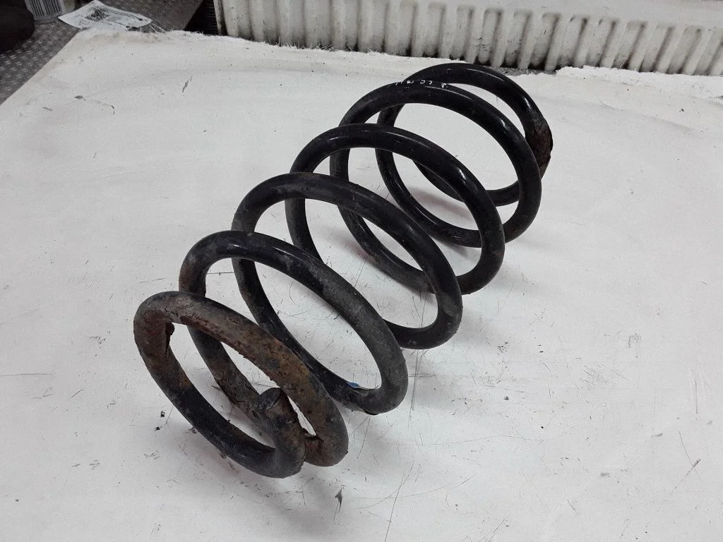 Front coil spring – Saab 9-5 (1998-2005)