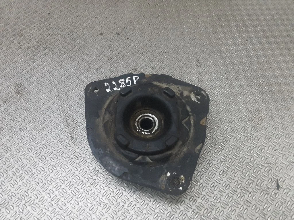 Front coil spring rubber mount