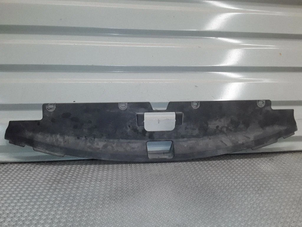 Engine bonnet/hood lock trim molding – Mitsubishi Outlander (2007-2012)