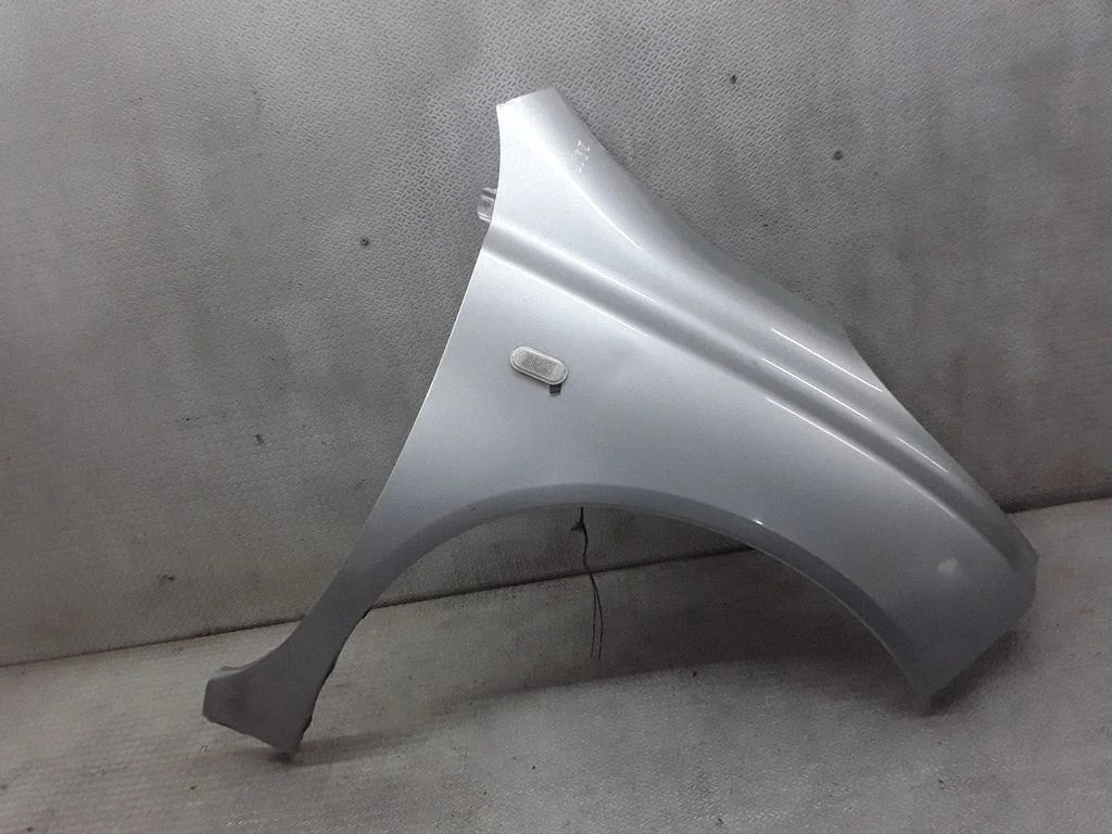 Błotnik – Nissan Micra (2003-2007), prawa